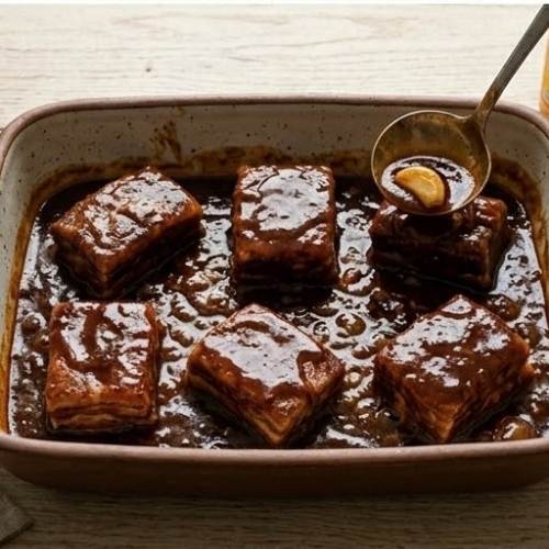 Step 6: Turn the Ribs and Bake Uncovered